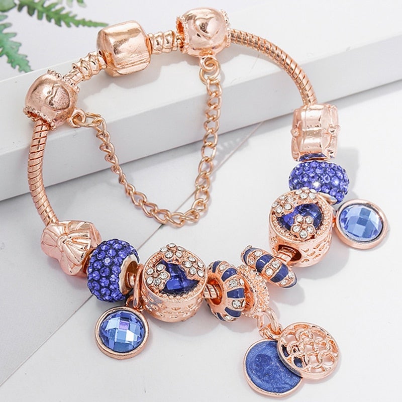 Rosélinea – Bracelet en or rose avec cristal bleu