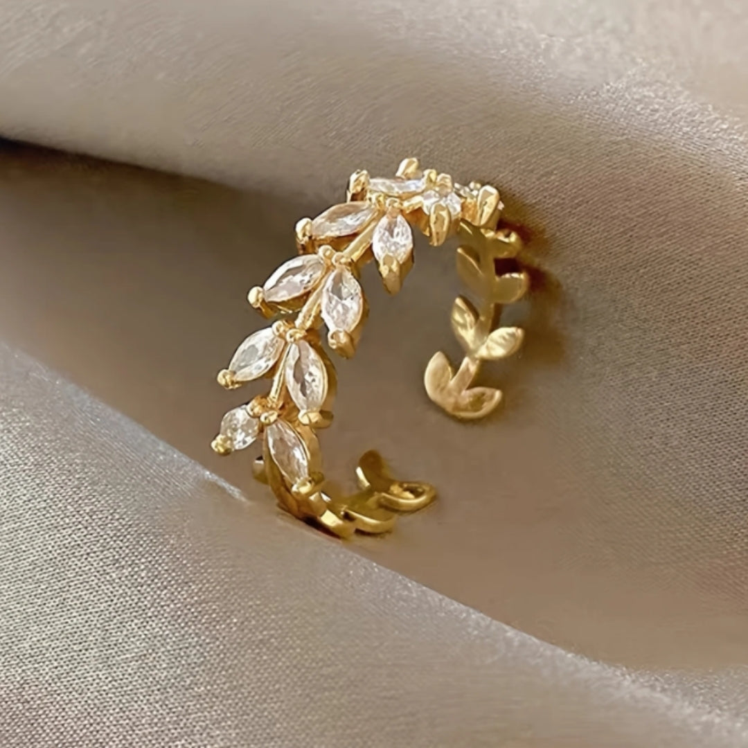 Feurolia – Bague dorée avec feuilles en zirconia