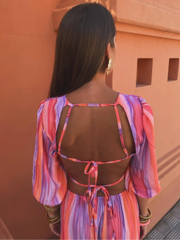 Elinaëlle – Élégante robe à découpes latérales
