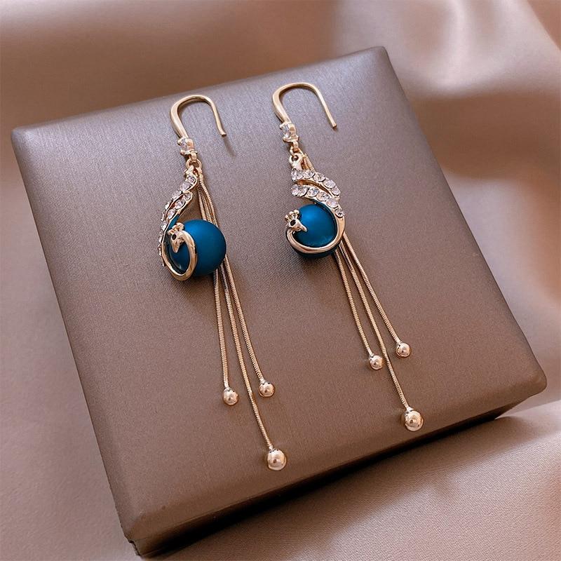 Azurélis – Boucles d’oreilles festives avec perles bleues