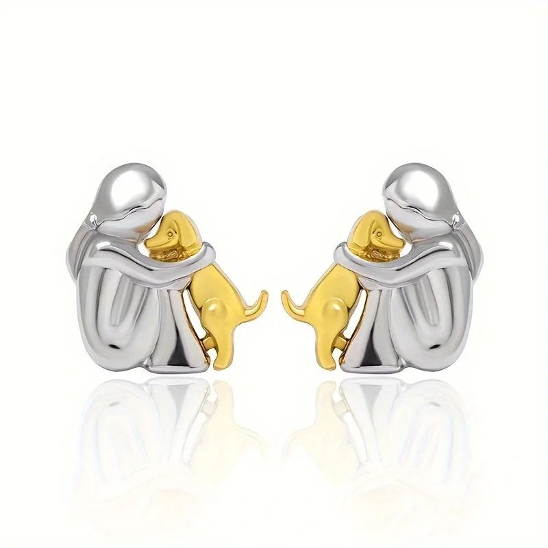 Chanel – Boucles d’oreilles avec icône de chien