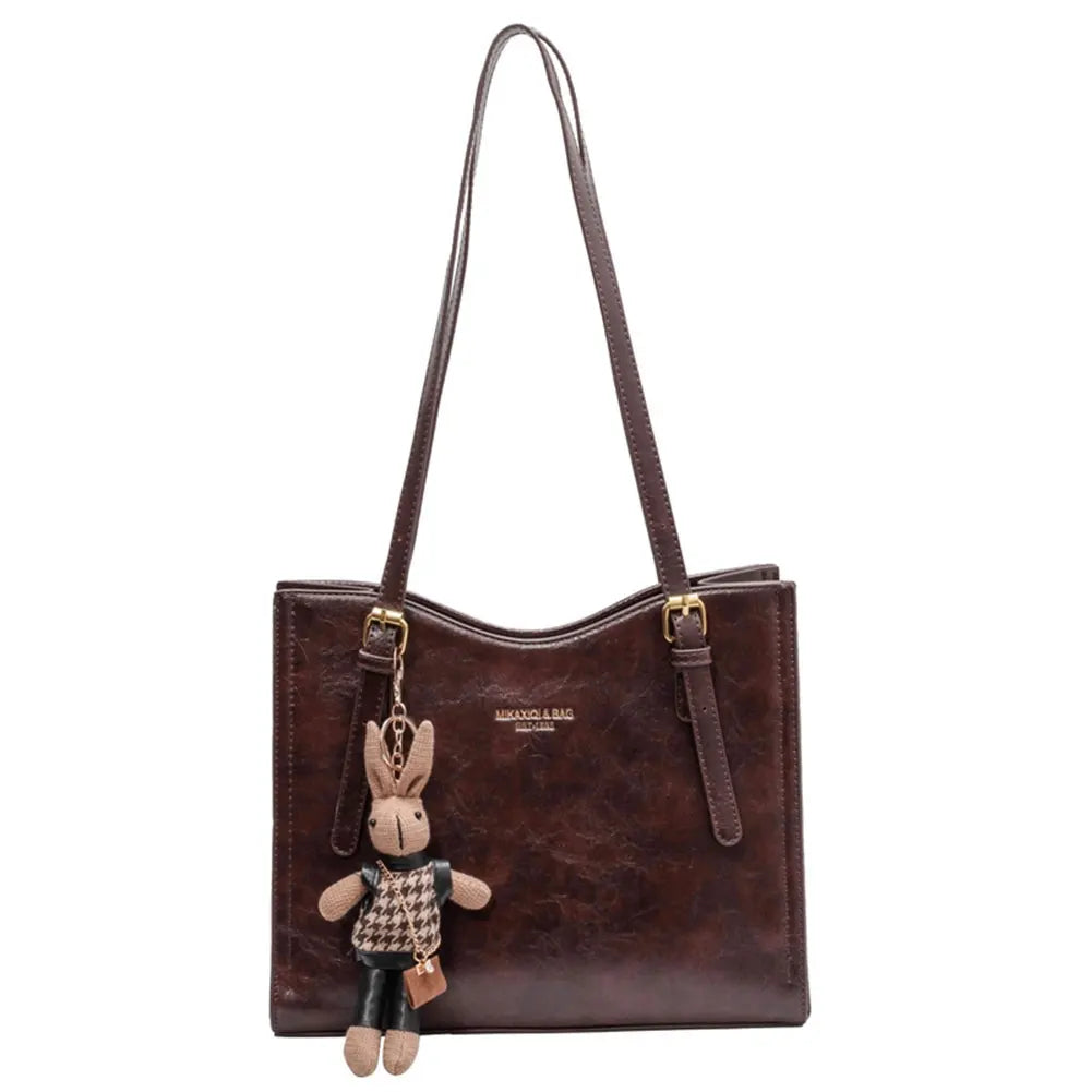 Janine – Sac fourre-tout élégant en cuir vegan avec breloque lapin