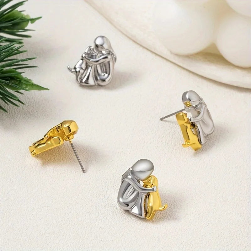 Chanel – Boucles d’oreilles avec icône de chien