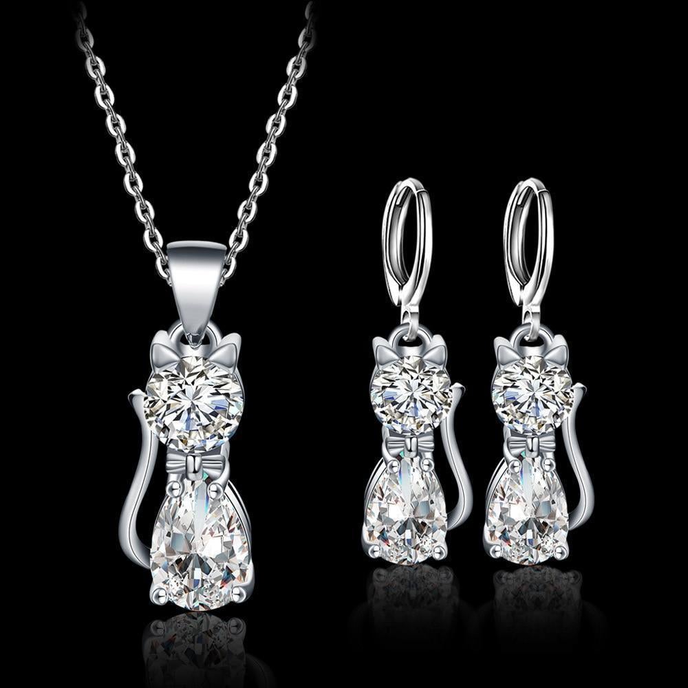 Félinéa – Set collier et boucles d’oreilles avec chats en zirconia blanc
